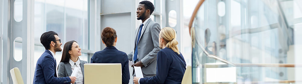 Colleagues discussing around a table
