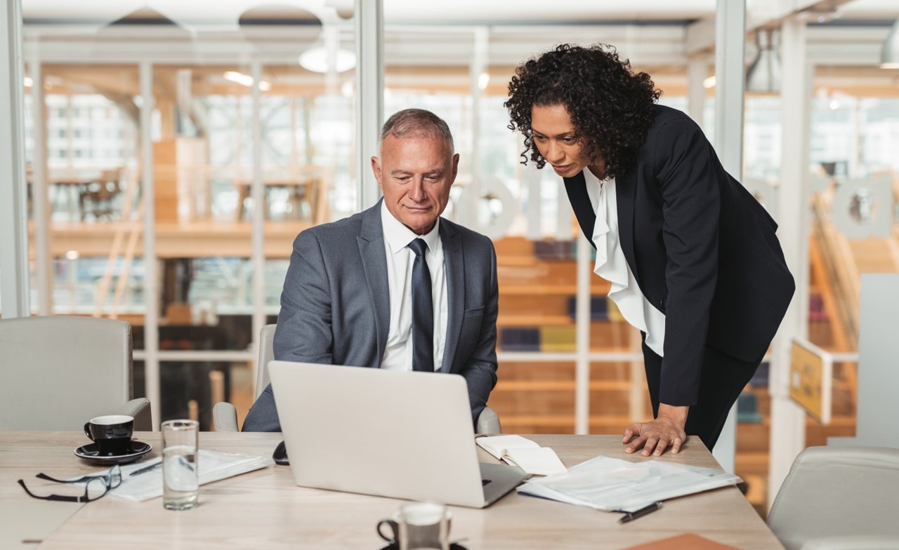 Consultants discussing managed IT services