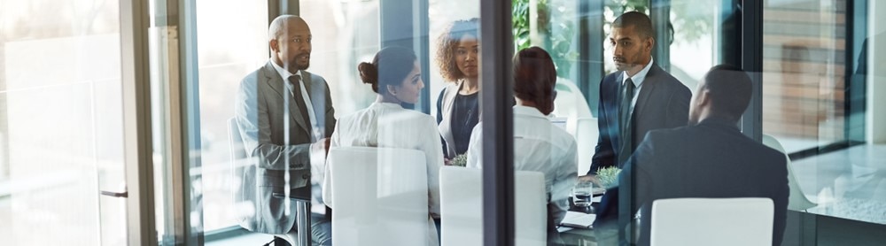 Consultants discussing managed IT services