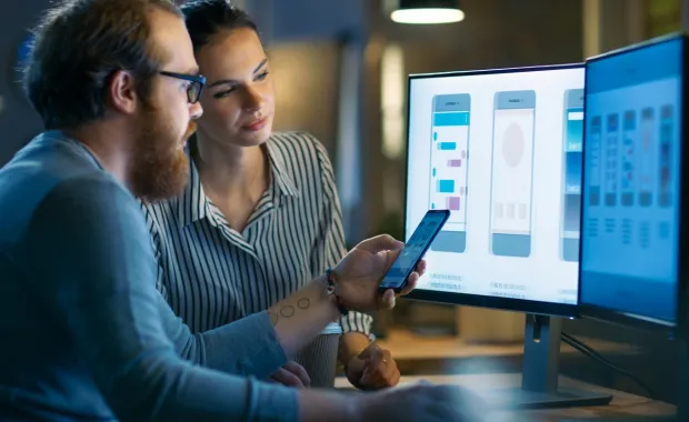 Engineers working on a desktop
