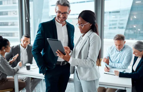 business people working on a tablet