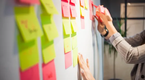 white  board with post-it notes