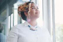 Consultant looking out a window