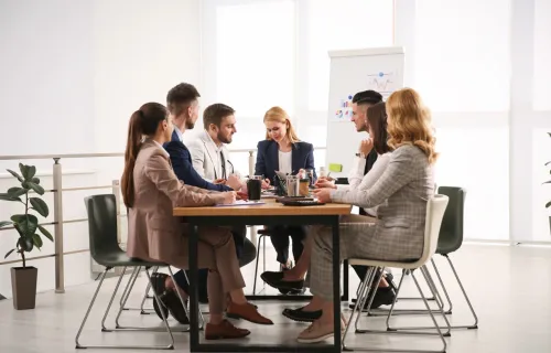 Consultants discussing AI's impact on management consulting