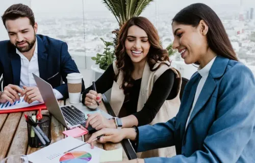 Professionals happily discussing about the results