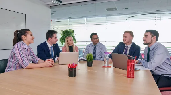 CGI partners in a meeting