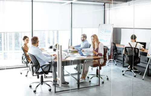 Group of testers working at a conference table