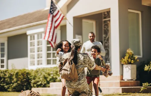 Soldier returns home to family running into her arms