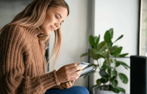 women looking at phone
